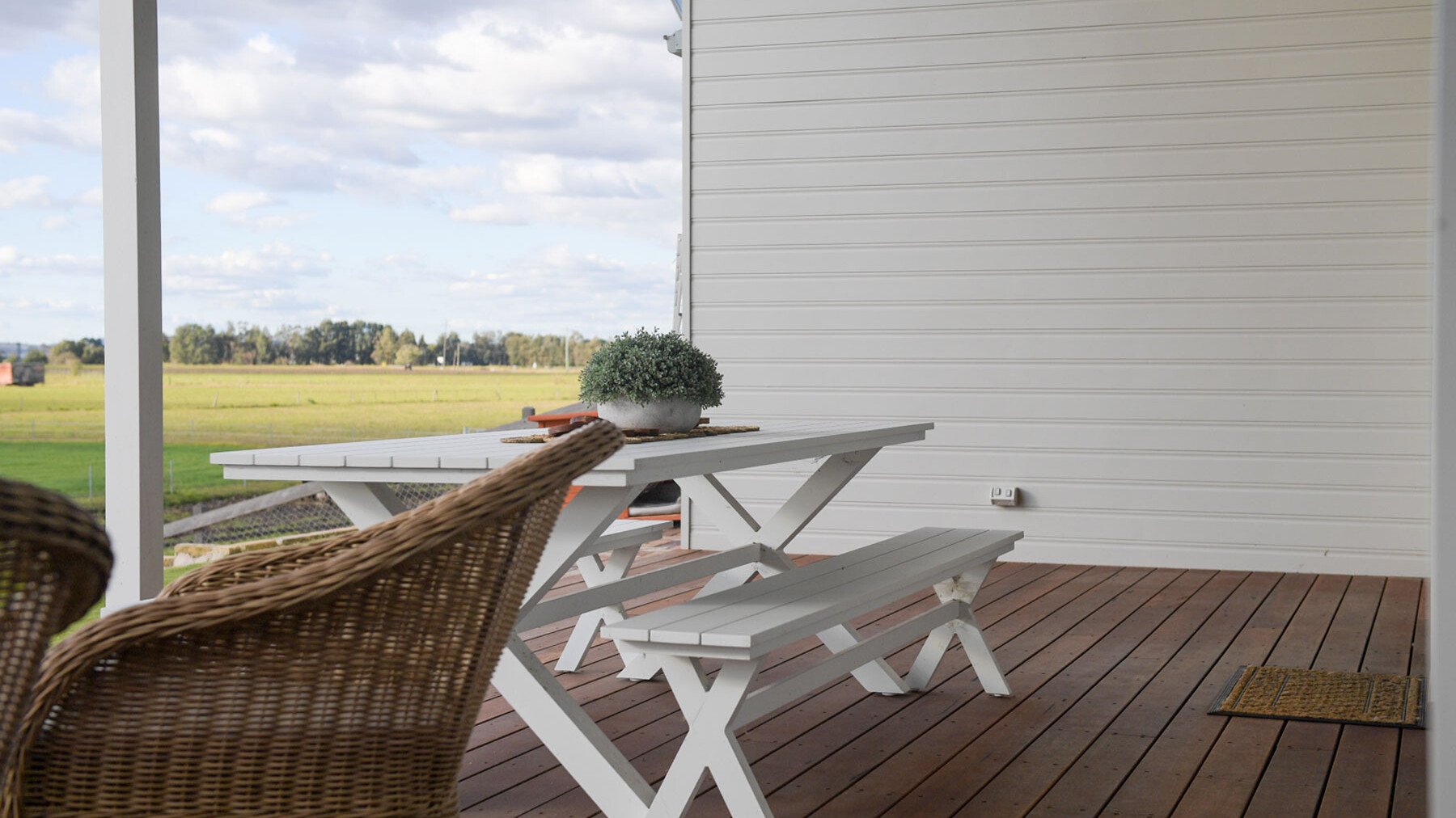 outdoor dining table on alfresco deck