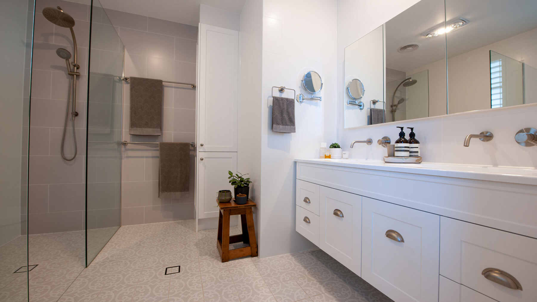 white bathroom with light grey floor tiles