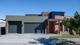 New home build, rustic industrial facade with large 3 car garage