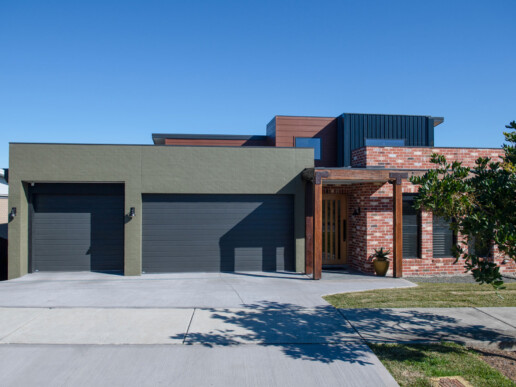 New home build, rustic industrial facade with large 3 car garage